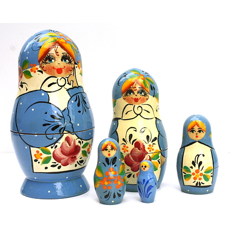 Artists Matryoshka blue pink flower on white apron and white dots (5 nested set) of Artists .