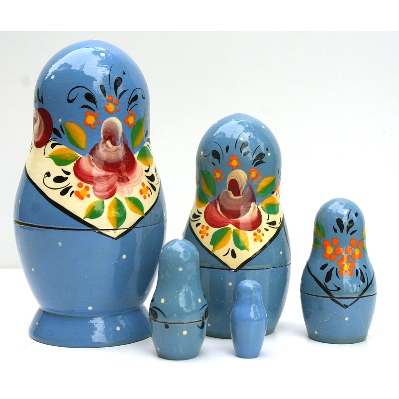 Artists Matryoshka blue pink flower on white apron and white dots (5 nested set) of Artists .