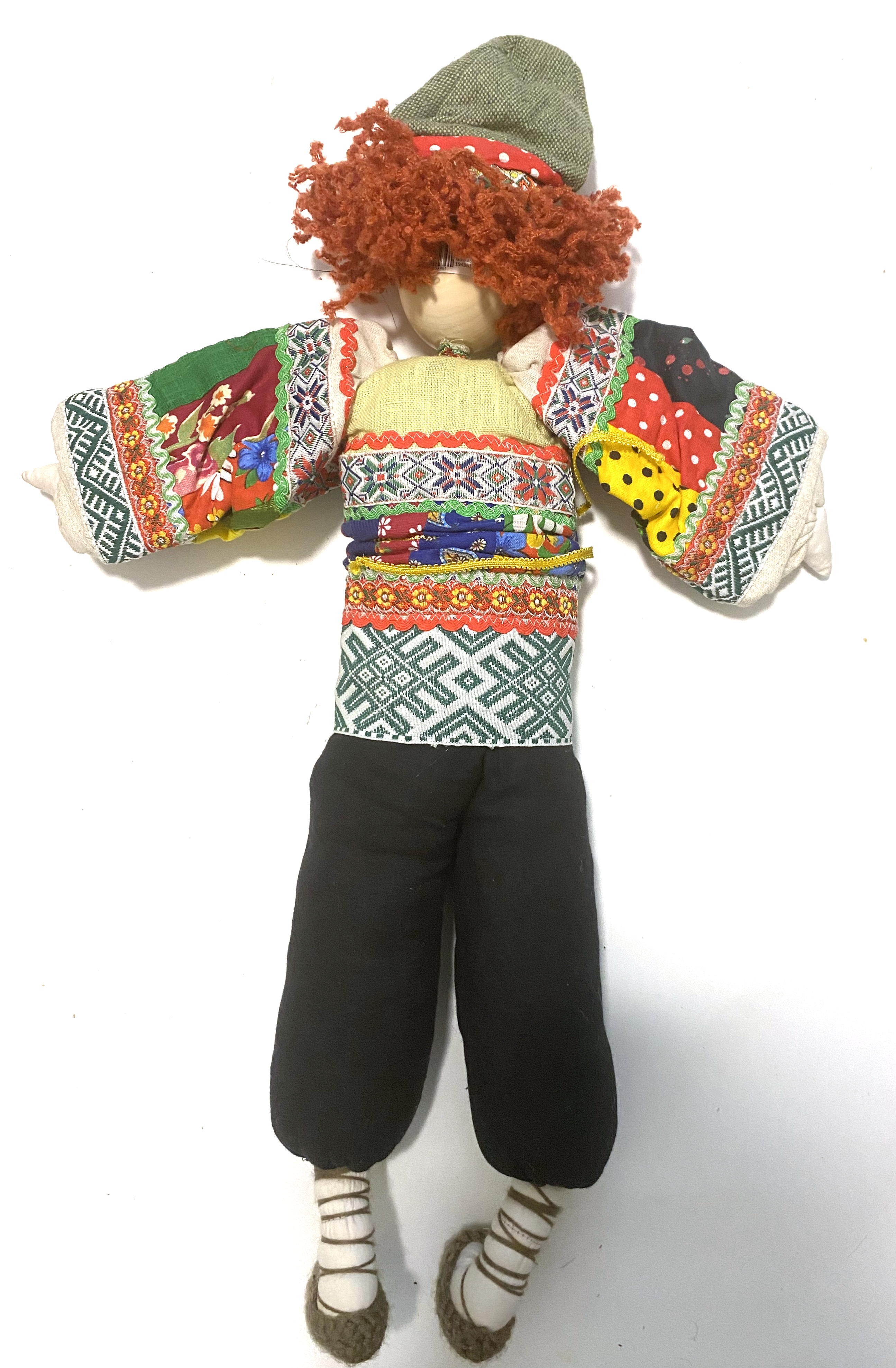 Cloth doll with wooden face, peasant boy